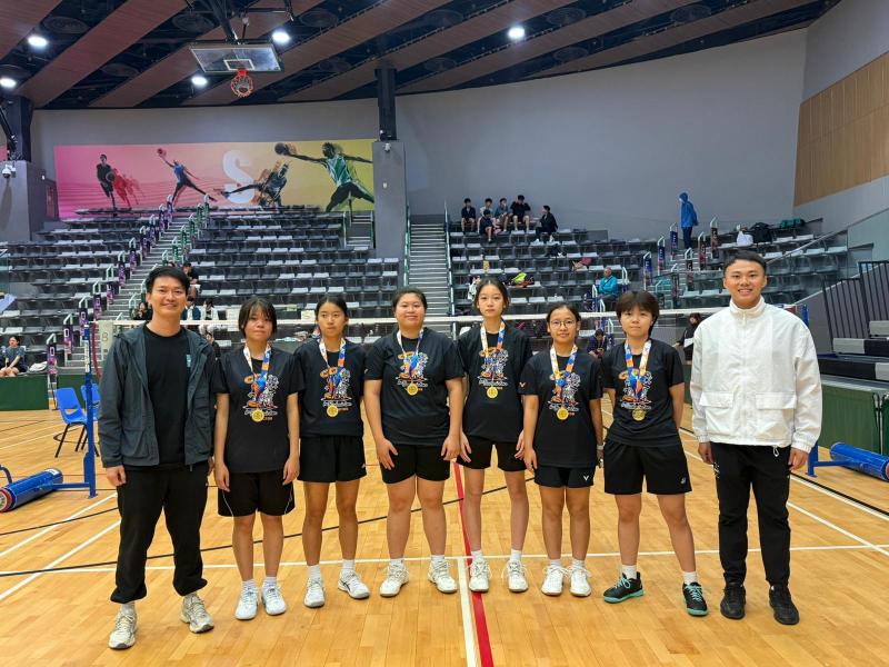 Girl's Grade A Badminton Team for winning the championship in the Yuen Long Inter-School Competition