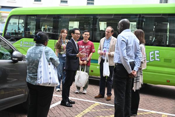 Welcome World YMCA Executive Committee Members to Chinese Y.M.C.A. Secondary School
