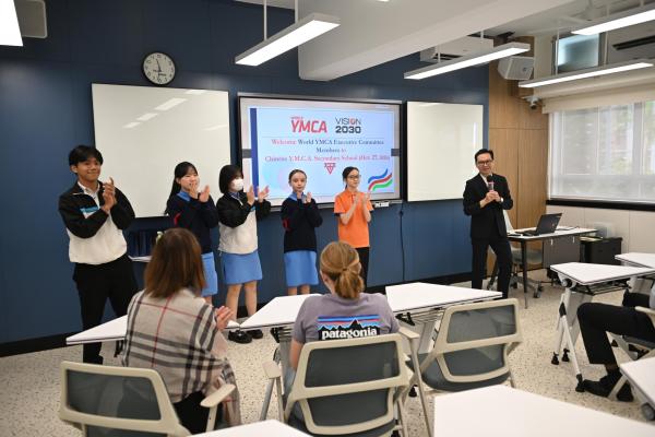 Welcome World YMCA Executive Committee Members to Chinese Y.M.C.A. Secondary School