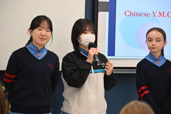 Welcome World YMCA Executive Committee Members to Chinese Y.M.C.A. Secondary School