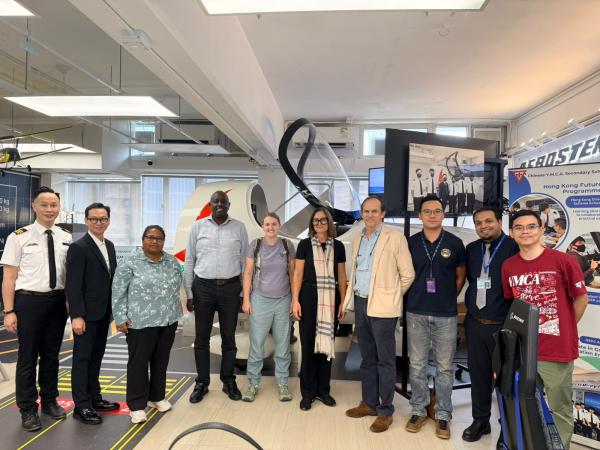 Welcome World YMCA Executive Committee Members to Chinese Y.M.C.A. Secondary School